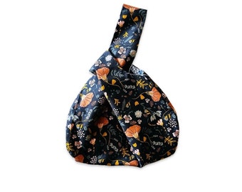 Japanese style knot bag, wristlet, fully lined  with small zipper pouch. Floral print