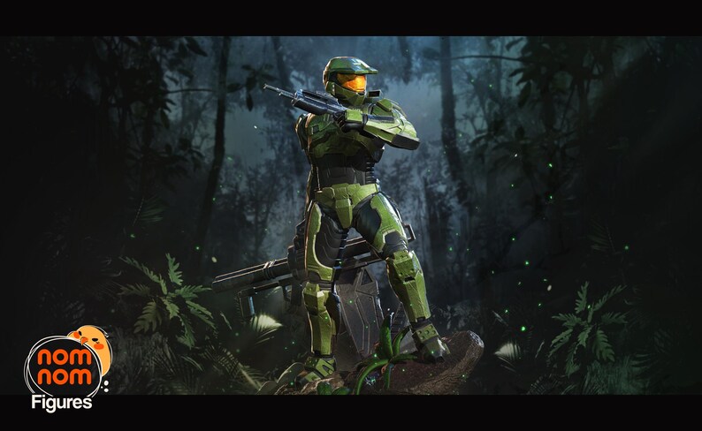 May include: A detailed action figure of a character in green and black armor, holding a rifle, set against a jungle backdrop. The figure has a helmet with an orange visor. The "Nom Nom Figures" logo is in the lower left corner.