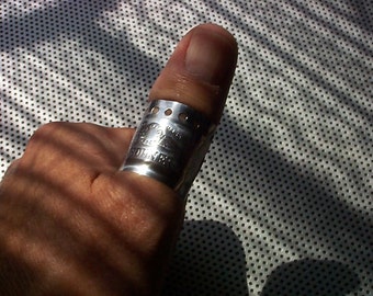 Music Fest Thumb Ring repurposed from harmonica plate