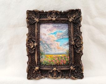 Floral meadow landscape oil painting | colorful wildflower field under dramatic sky | hand painted scenic artwork in ornate vintage frame