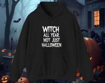 May include: Black hooded sweatshirt with the text "WITCH ALL YEAR, NOT JUST HALLOWEEN" in white. The image has a Halloween theme with pumpkins and bats.