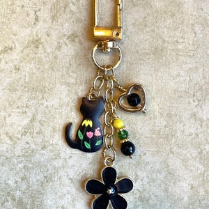 Kattenbedel, kattentascharme, kattensleutelhanger, kattencadeau, kattenliefhebber cadeau, kattenmoeder cadeau, kat ritstrekker, dierenbedel