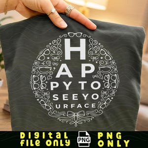 May include: Dark gray fabric with a white graphic that reads "HAPPY TO SEEYO URFACE" in a circle of eyeglasses and bows. The words "DIGITAL FILE ONLY" and "PNG ONLY" are at the bottom.