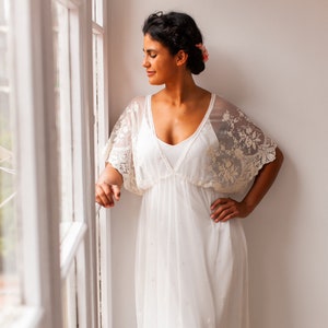 Country wedding dress in embroidered scalloped tulle with butterfly sleeves