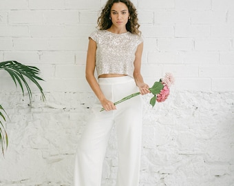 White bridal pantsuit set with sequin crop top, minimalist pants, backless top, wedding suit for women, cocktail attire, rehearsal dinner