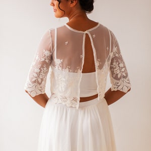 Romantic embroidered bridal top in scalloped tulle with crew neck and three quarter sleeves image 8