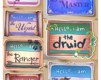 May include: A collection of seven rectangular stickers featuring the text HELLO, i am followed by character roles: the Bard, the Dungeon Master, the Wizard, the Druid, the Ranger, the Warlock, and the Cleric. Each sticker has a unique border and color scheme.