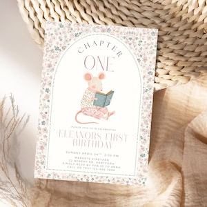 May include: A floral-patterned invitation card with the text "Chapter One" and "Eleanor's First Birthday." The card features a watercolor illustration of a mouse reading a book. The color palette includes pink, green, and beige.