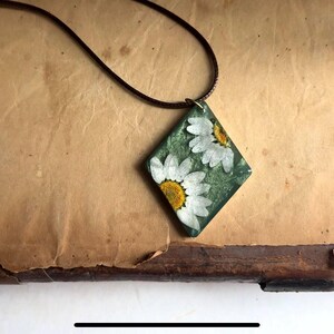 White Daisy Preserved in Vibrant Green Resin Pendant