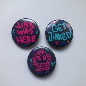 Jinx-Graffitispelden, Knopen, Arcane