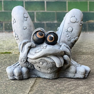 Frog with tongue out statue Funny frog garden sculpture Cement toad figurine Outdoor frog decor Playful animal ornament Garden amphibian