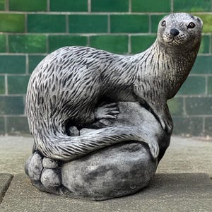 Outdoor otter sculpture Stone otter statue Handmade wildlife figurine Garden pond decoration Realistic animal ornament Otter lover gift