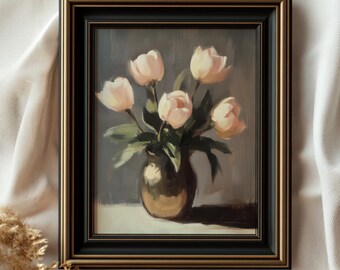 May include: A framed painting of a bouquet of pale pink tulips in a gold vase. The painting has a dark gray background and is framed in a black frame with a gold trim.