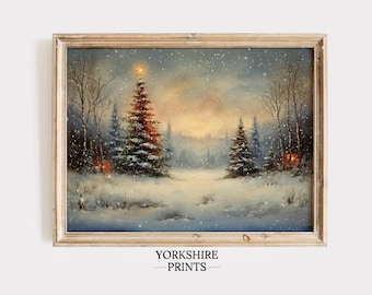 May include: A framed landscape print featuring a snow-covered forest scene with a central illuminated Christmas tree topped with a star. The artwork displays a winter setting with falling snow, bare trees, and warm glowing lights, labelled YORKSHIRE PRINTS.