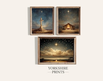 May include: Three framed art prints with a religious theme. The prints depict a cross, a stable, and a starry night scene. The artwork has a vintage, painterly style with warm, earthy tones and a celestial glow. The text "YORKSHIRE - PRINTS -" is at the bottom.