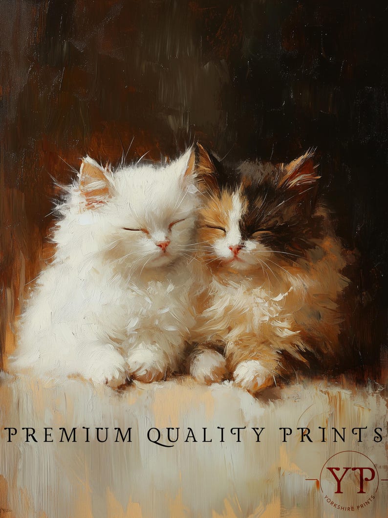 May include: Two adorable kittens, one white and one calico, are curled up together sleeping on a soft, light brown surface. The kittens have their eyes closed and their paws tucked under their bodies. The background is a dark brown color.