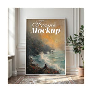 Puede incluir: Una impresión de arte mural rectangular vertical que presenta una pintura de paisaje marino con una persona sentada en un acantilado rocoso frente a olas turquesas rompientes. El cielo es un degradado de naranja y gris. El texto Frame Mockup está impreso en blanco.