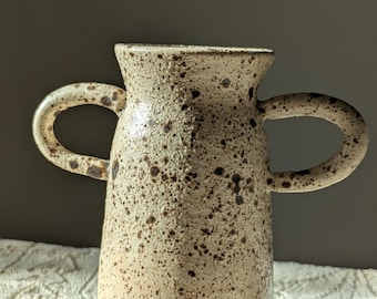Small speckled bud vase with handles