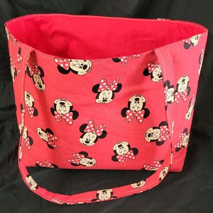 Red Minnie Mouse Tote bag open to show red lining