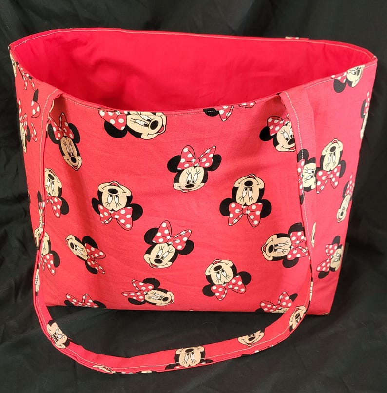 Red Minnie Mouse Tote bag open to show red lining