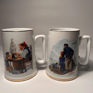 Vtg. Tasses en forme de stein de Norman Rockwell. Lot de 2 « Looking Out To Sea » et « For A Good Boy » 1985