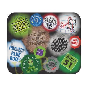 May include: A black, rounded-cornered graphic with various text elements related to extraterrestrial themes. Includes phrases like "EBE1 Entity," "Project Blue Book," "Area 51," and "Drake Equation." The design incorporates circles and text overlays.