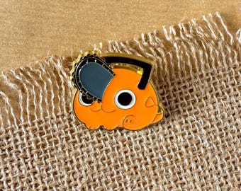 Kawaii Orange Chainsaw Dog Enamel Pin – Cute Anime Accessory for Fans & Collectors
