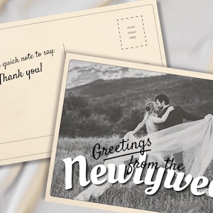 Customizable wedding thank you card template with retro postcard design and “Greetings from the Newlyweds” text. Editable Canva file with vintage aesthetic, used old paper style, and space for a wedding photo. Backside styled like a postcard for handwritten or digital notes. Perfect for newlyweds, printable wedding photo cards, modern vintage stationery, and travel-inspired wedding thank you cards. Canva template for wedding thank you photo card.