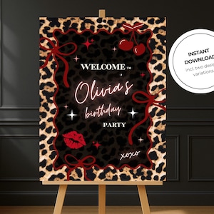 May include: A party welcome sign on an easel with a leopard print background. The sign has a black border with red bows and cherries. The text reads "Welcome to Olivia's birthday party" in a neon style font. A red kiss mark and stars are also included.