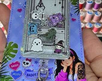 Halloweenie claw machine shaker badge reel (alligator clip)