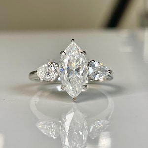 Marquise Moissanite Engagement Ring: Pear Side Stones, Sterling Silver