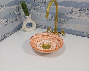 Moroccan handmade ceramic sink – round orange patterned wash basin – elegant design blending tradition and luxury