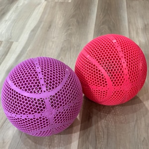 Airless Basketball Woman's Size 6 (28.5 in.) Shoots and bounces similar to a regular ball. Indoor Outdoor durable 3D printed ball.