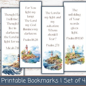May include: Set of four printable bookmarks featuring watercolor illustrations of lighthouses on rocky shores. Each bookmark includes a Bible verse. The text "Printable Bookmarks | Set of 4" is at the bottom.
