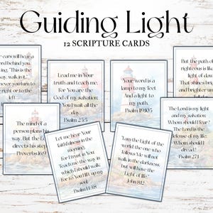 May include: A collection of 12 scripture cards with inspirational quotes and lighthouse illustrations. The cards feature various Bible verses in a rectangular format, with a watercolor-style background and the words "Guiding Light" at the top.