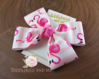Tropical aqua blue green with pink flamingo print 4" Pin up hair bow clip Tropical aqua blue green with pink flamingo print 4" Pin up hair bow clip