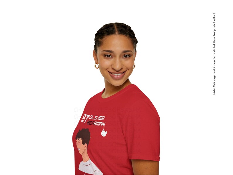 May include: A red t-shirt with a white graphic of a cartoon person with the text "87 Oliver Berriman".