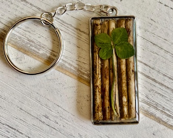 Llavero auténtico de trébol de cuatro hojas, joya rústica, amuleto para bolso o cartera, regalo para el Día de San Patricio.
