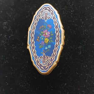 lipstick holder with flip up mirror.