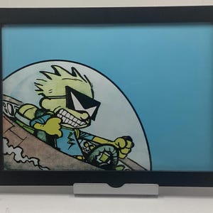 Calvin and Hobbes Spaceman Spiff framed print