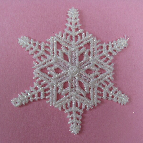 1970's applique patch. glitter lace snowflake.