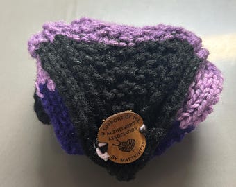 Diadema solidaria para la lucha contra el Alzheimer - Tejida a mano con botón de cuero