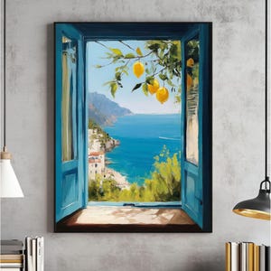 Peut inclure: Peinture encadrée représentant une scène côtière vue à travers une fenêtre bleue. L'œuvre d'art présente une mer bleu vif, une côte avec des bâtiments blancs et une branche de citrons. Le cadre de la fenêtre est d'un bleu saisissant.
