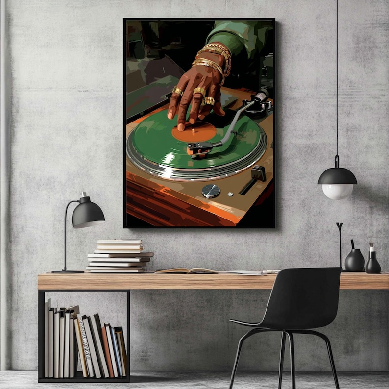May include: A framed art print depicts a DJ's hand adorned with gold jewelry, manipulating a green vinyl record on a turntable. The artwork features a color palette of green, brown, and gold, creating a retro vibe. The image is set against a neutral gray background.