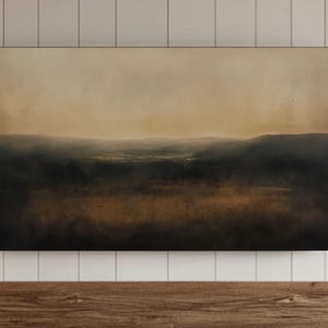 May include: A painting of a landscape with a hazy, golden sky and a dark, rolling hillside in the foreground.