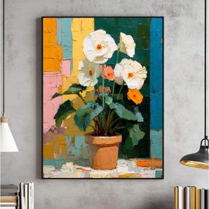 Puede incluir: Pintura al óleo de flores blancas con centros naranjas y hojas verdes en una maceta de terracota. El fondo presenta bloques verticales de color en amarillo, rosa, turquesa y verde. La obra está enmarcada en negro.