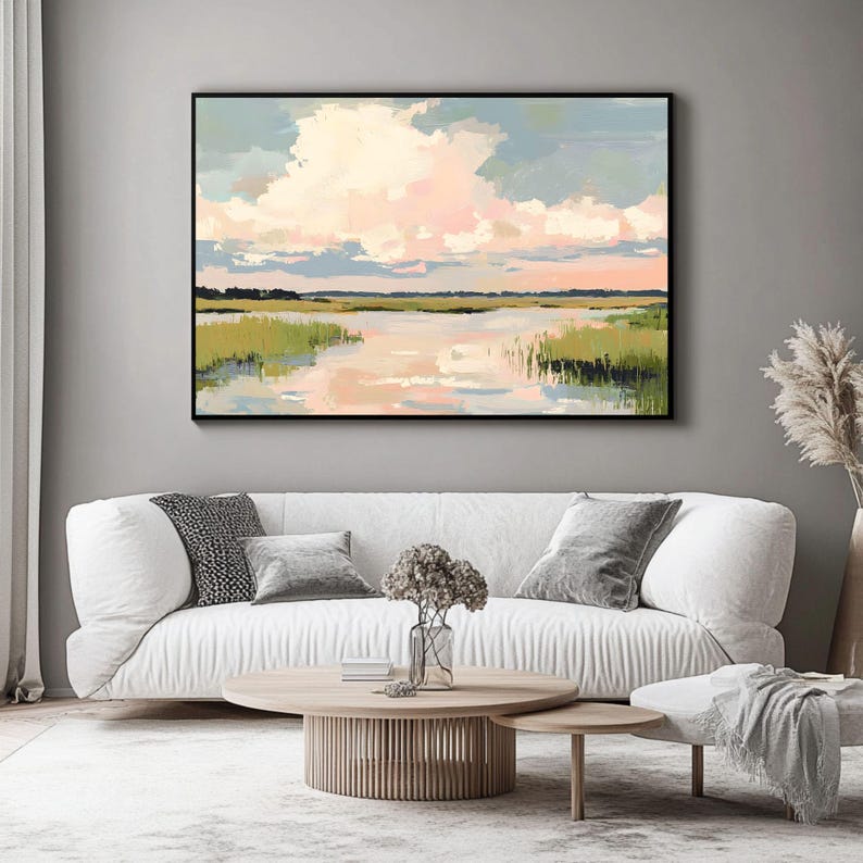 May include: A painting depicting a landscape with a river, green reeds, and a cloudy sky. The sky is a soft pink and blue, and the water reflects the colours of the sky.