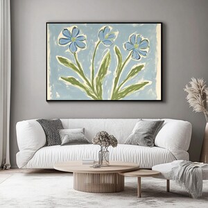 Puede incluir: Una pintura de tres flores azules con tallos y hojas verdes sobre un fondo azul claro.