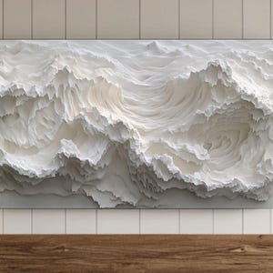May include: Abstract art print featuring a white and cream textured design resembling swirling clouds or waves.