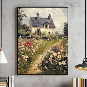 May include: A framed painting depicts a quaint cottage with a dark gray roof, surrounded by a vibrant garden path filled with colorful flowers. The artwork features a serene landscape with a cloudy sky and lush greenery.